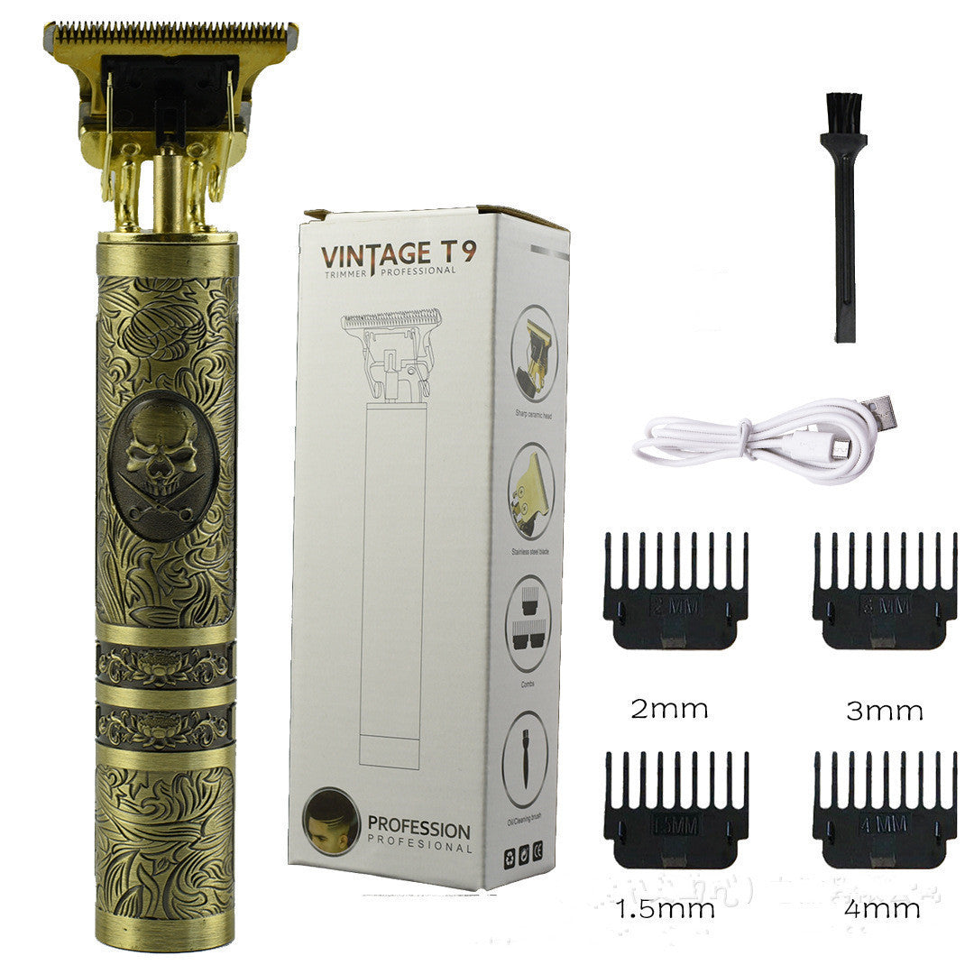 Cordless vintage-style gold professional hair trimmer with skull design, USB charger, cleaning brush, and four guide combs
