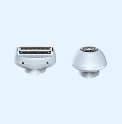 Two interchangeable white epilator and electric shaver heads for rechargeable USB hair removal device on light background